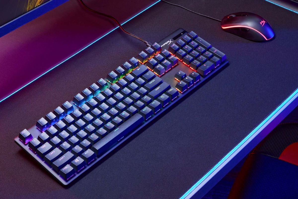 Alloy Origins PBT Full Size Gaming Keyboard on a desk with mouse setup