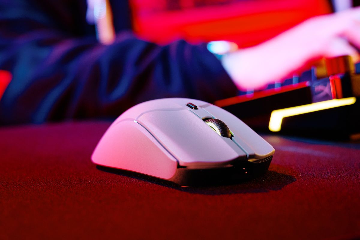pulsefire haste 2 pro on a desk whilst a gamer uses their keyboard