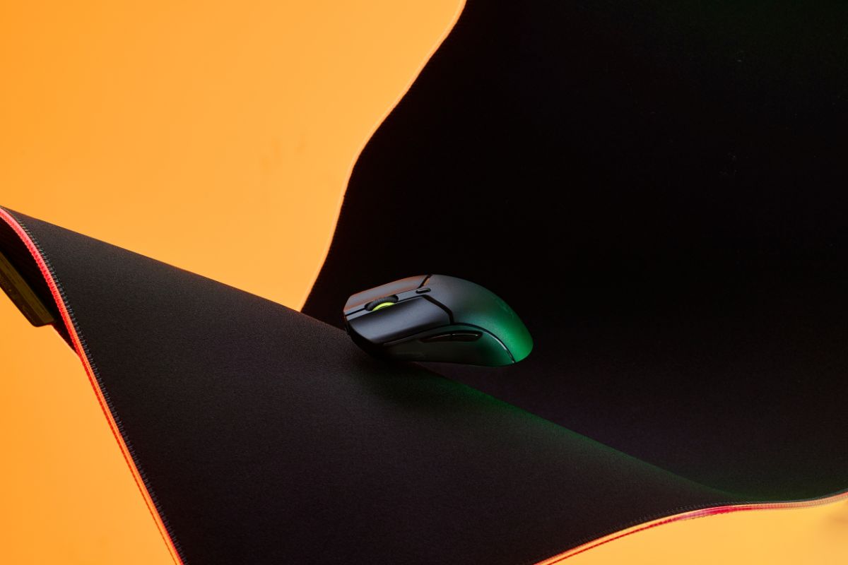 Pulsefire Haste 2 Mini Wireless  stylized on a yellow background