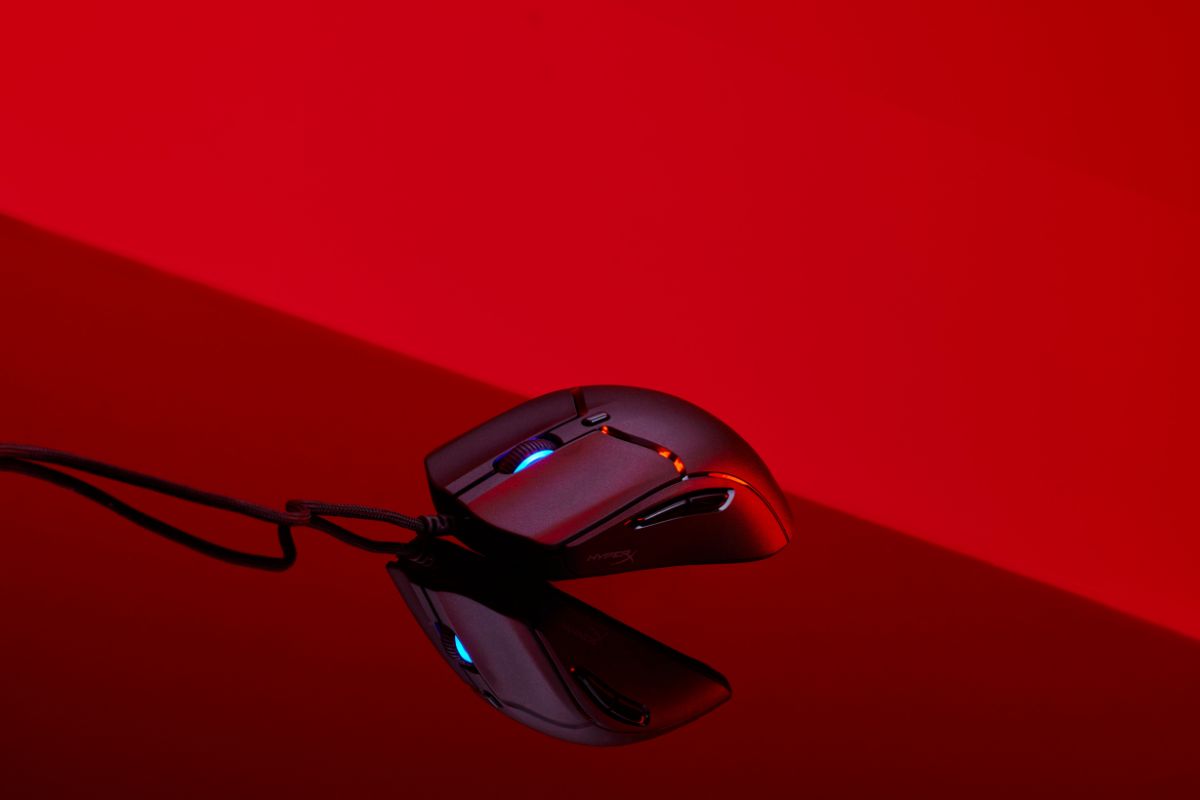 Pulsefire haste 2 mouse stylized on a red and black background